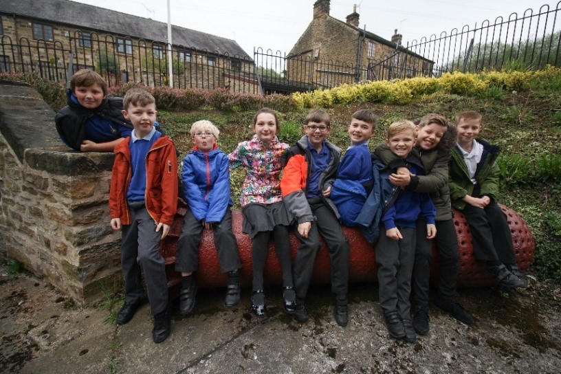 alt="school children helping with consultation"