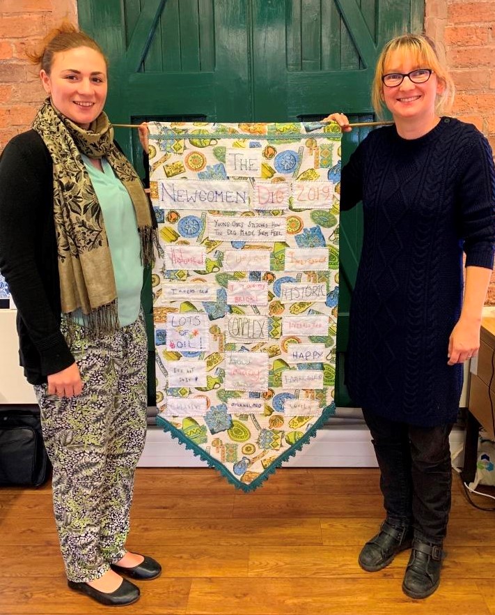 alt="hand stitched dig banner"