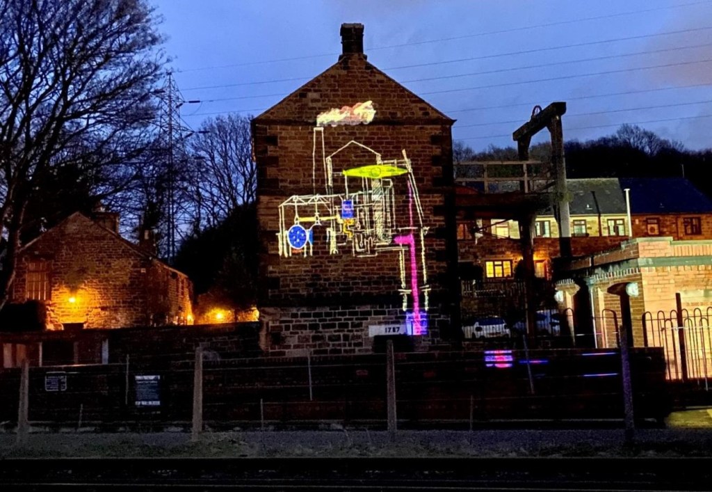 alt="projection onto Newcomen Engine wall"