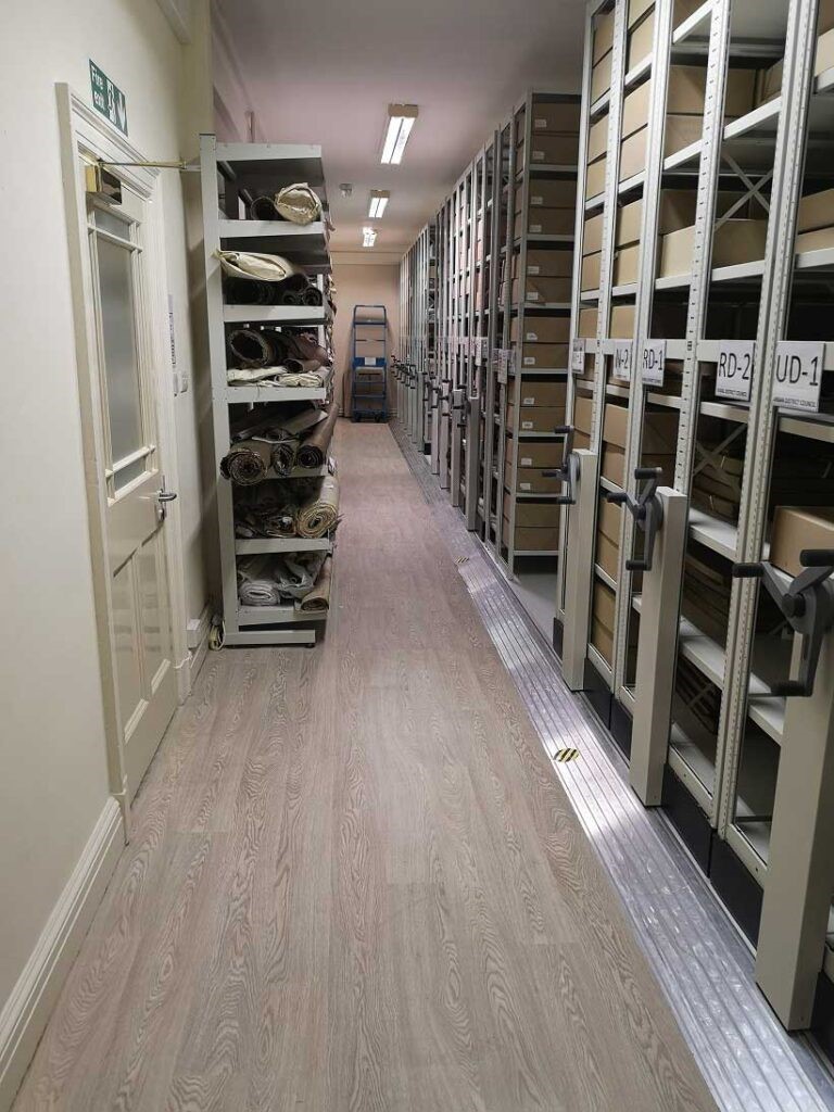 New archives store, with hundreds of boxes neatly labelled on shelves.