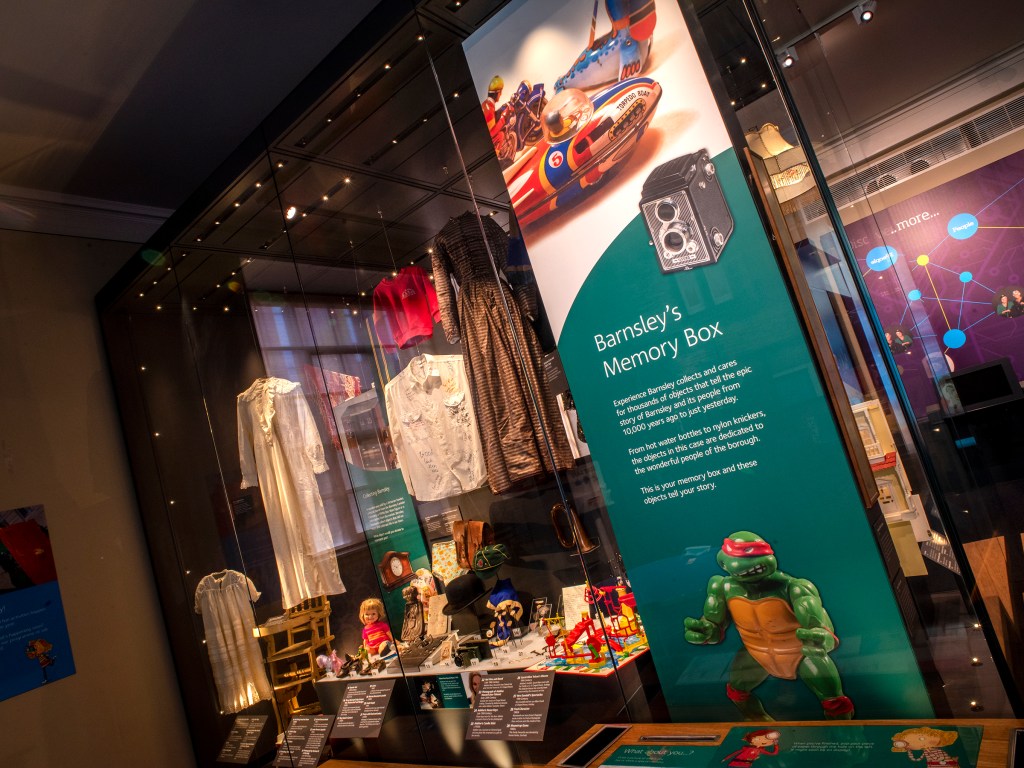 A photo showing the Barnsley Memory Box museum case at Experience Barnsley 