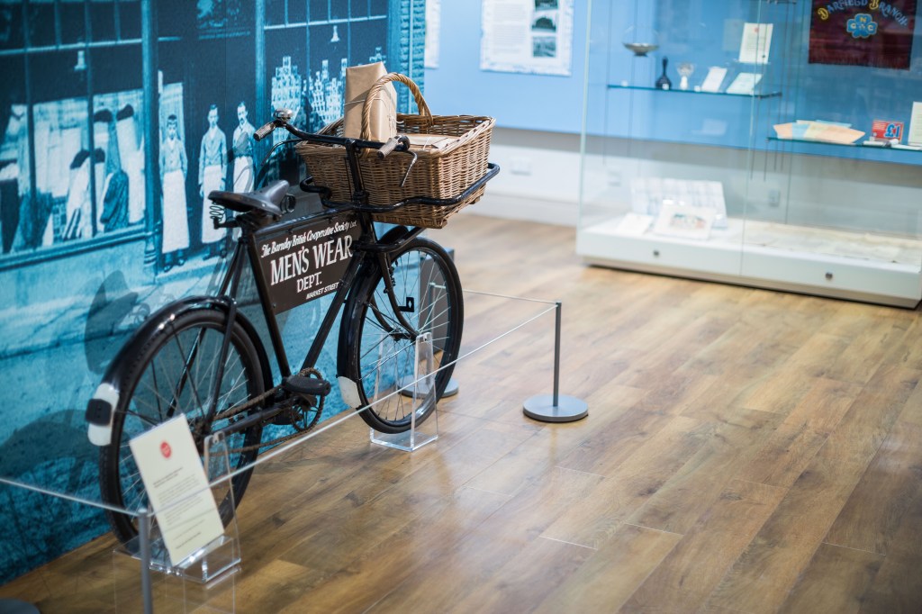 a view of the exhibition including a bicycle