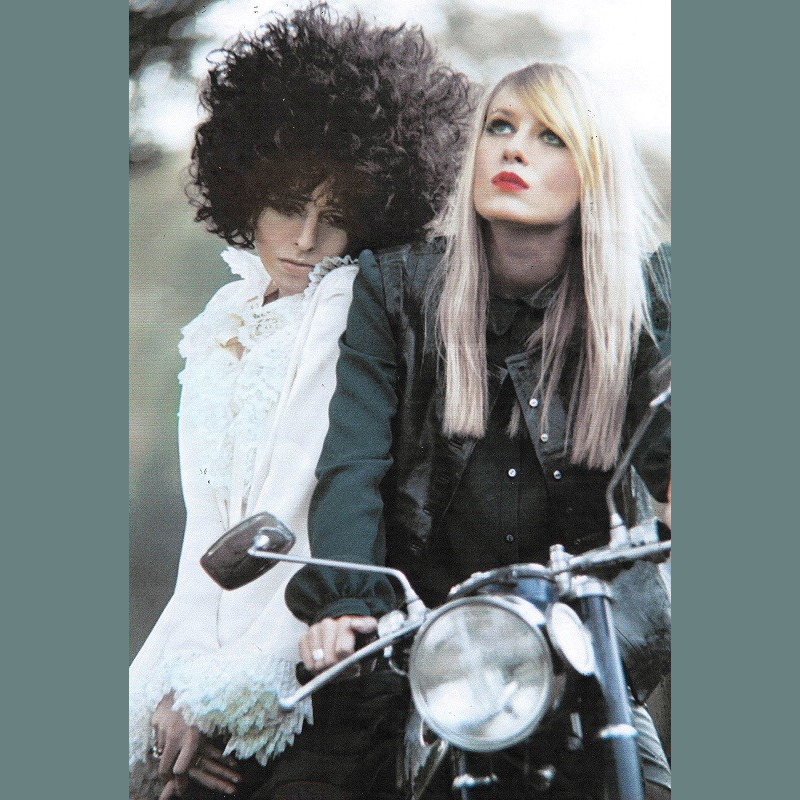 Victoria and another person on a motocycle