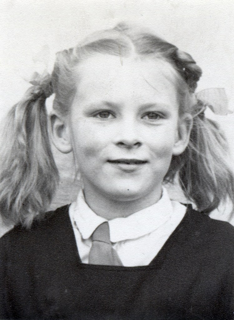 Victoria Nixon in school uniform