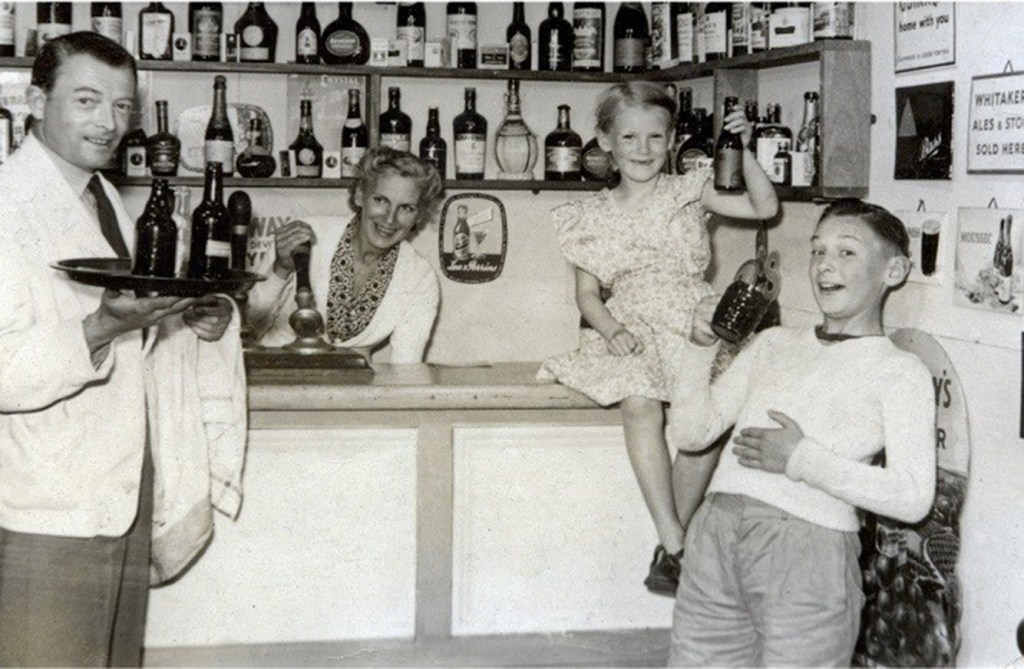 A family photo in a pub setting