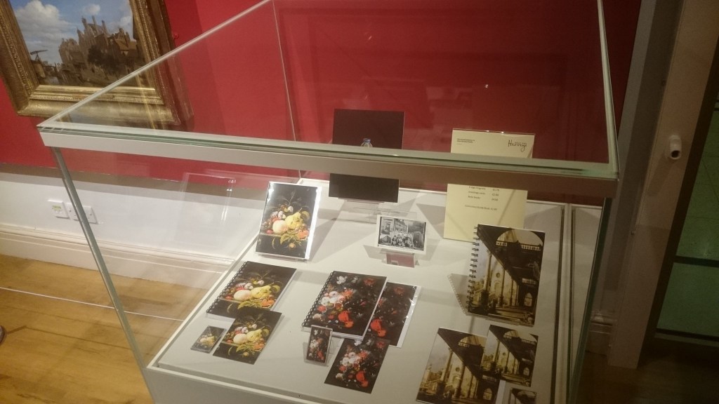 notebooks featuring artwork from the exhibition