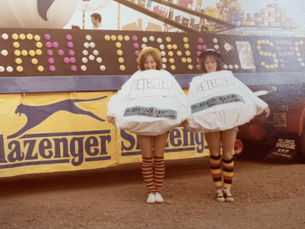people dressed up as rejected tennis balls in a mayors parade