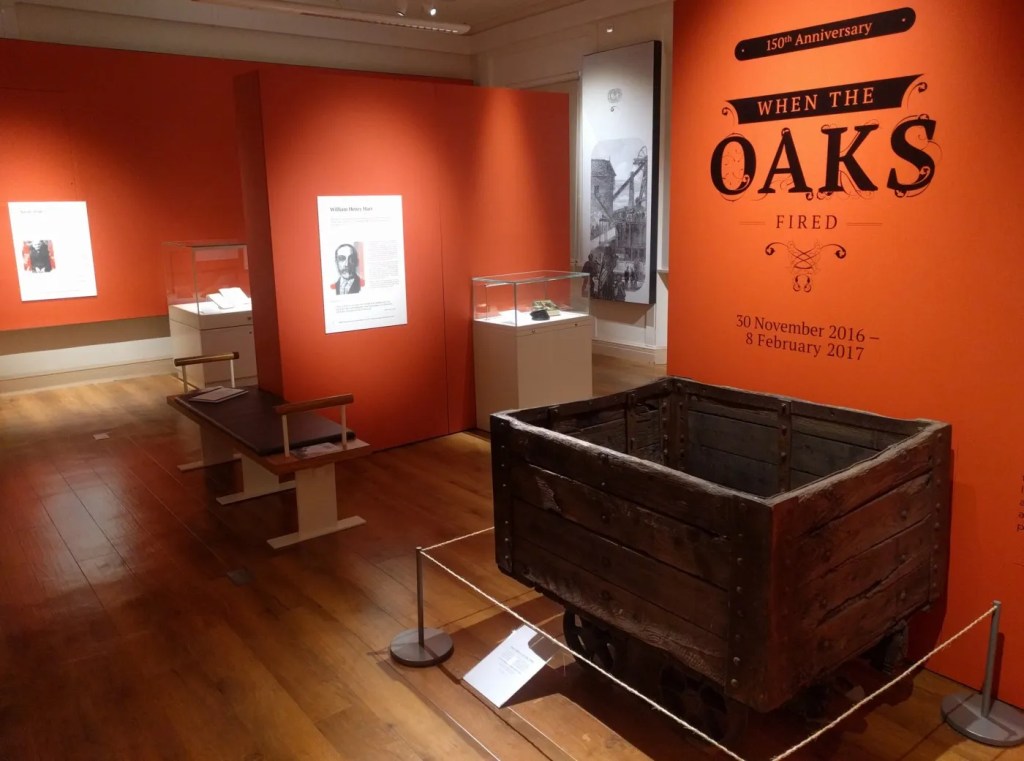 a view of the exhibition including a coal cart