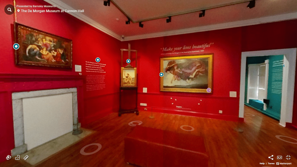 A screenshot of the De Morgan virtual tour, the room is bright red with a number of paintings on the wall