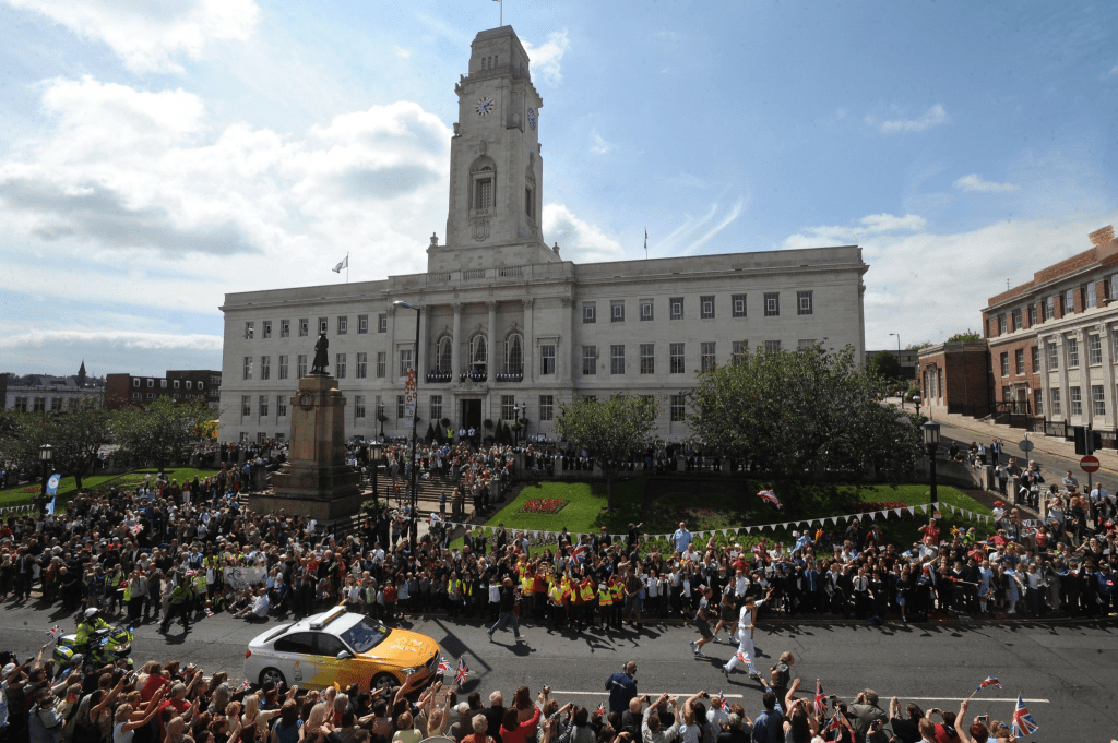 A sunny day in Barnsley as the Olympic torch reaches the town hall