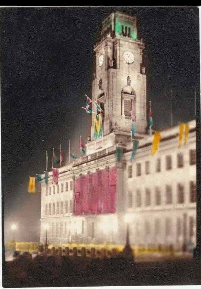 A colurised photo of the town hall