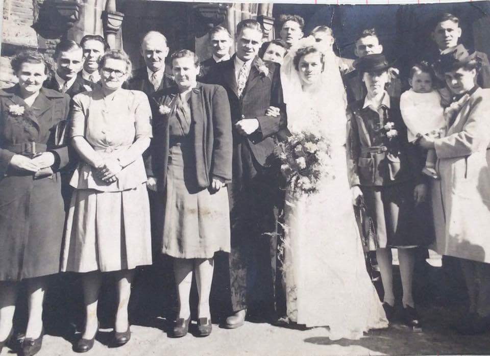 the happy couple outside the town hall on their wedding day