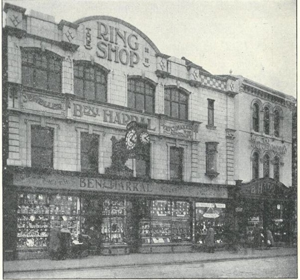 Black and white photograph of the Ring Shop with its new decorative faience frontage.