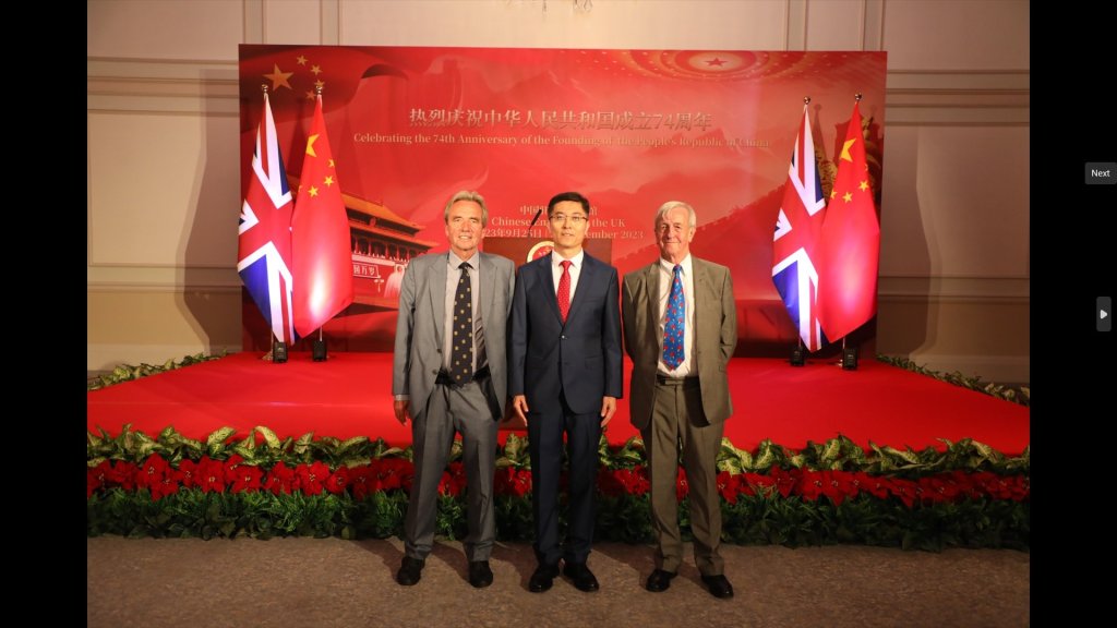 Alan with two other men at the Chinese Embassy