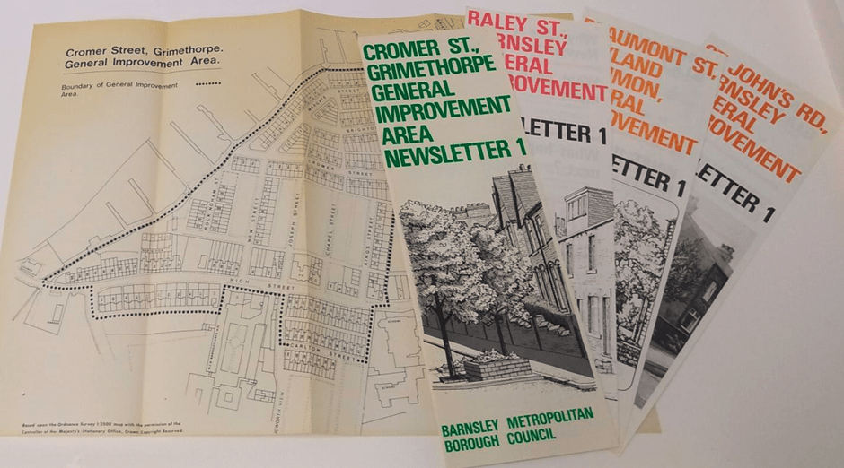 A group of folded papers with maps. Top newsletter for Cromer Street, Grimethorpe Improvement Area, Barnsley Metropolitan Borough Council.