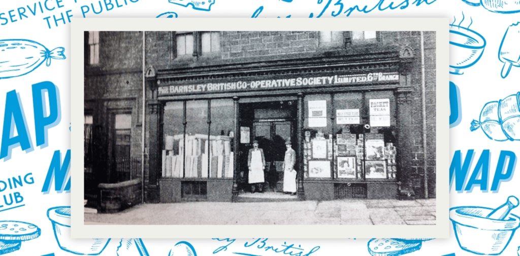 Historic photograph of the Barnsley British Co-operative Society store, showcasing its facade and entrance during the early 20th century.