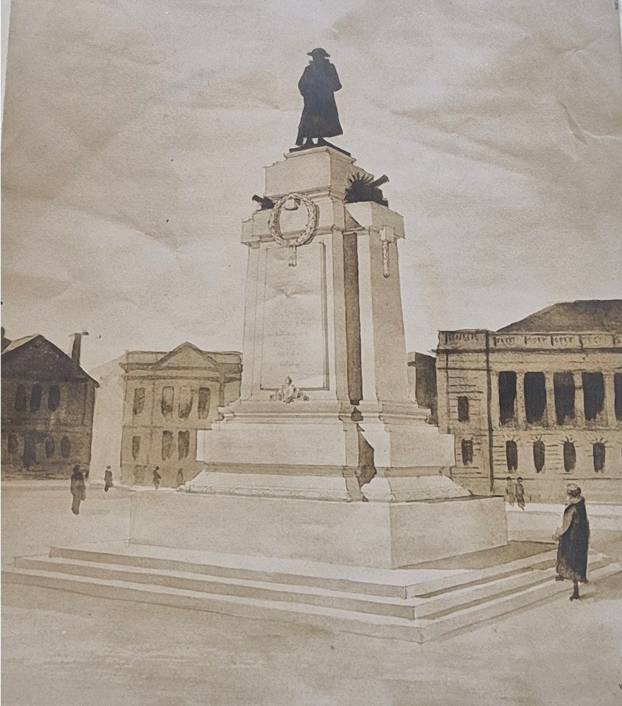 Historic photograph of Barnsley's war memorial with a statue atop a tall monument, surrounded by buildings and pedestrians.