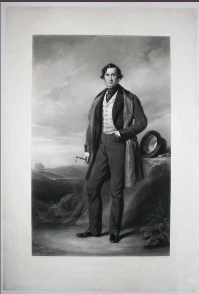 A monochrome portrait of a gentleman standing outdoors, dressed in 19th-century formal attire with a coat and waistcoat, holding a cane, with a hilly landscape in the background.